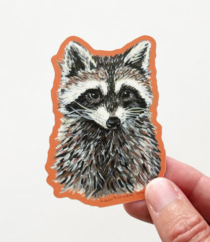 Raccoon Sticker by Heartshake Studios
